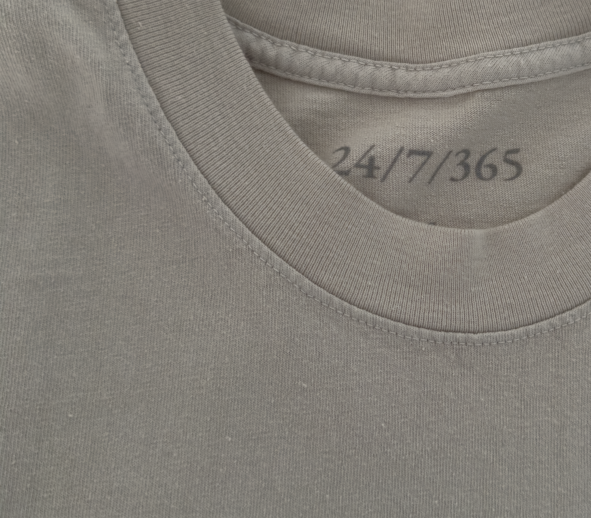 LA-made cotton tee, ribbed collar, hand-stitched tag. Versatile city style at $25. Grey, ribbed collar